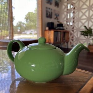 Cute, small green teapot